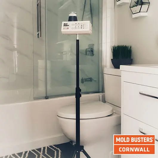 Mold Busters technician performing air quality testing in a Cornwall, Ontario home