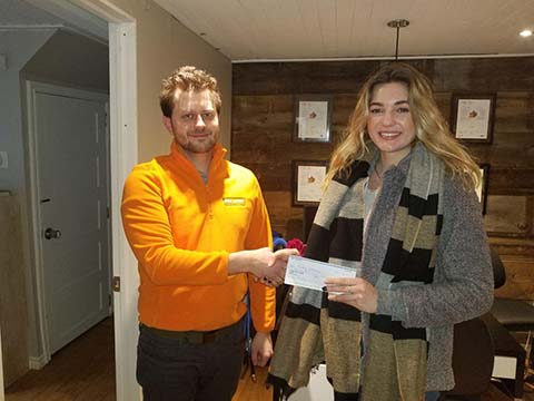 Renay Cormier, Winner of the Mold Busters Essay-Writing Contest Receives Check from Michael Golubev