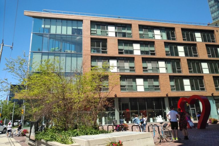 Brick warehouses and modern condos in Toronto's Distillery District, served by Mold Busters' GTA inspectors