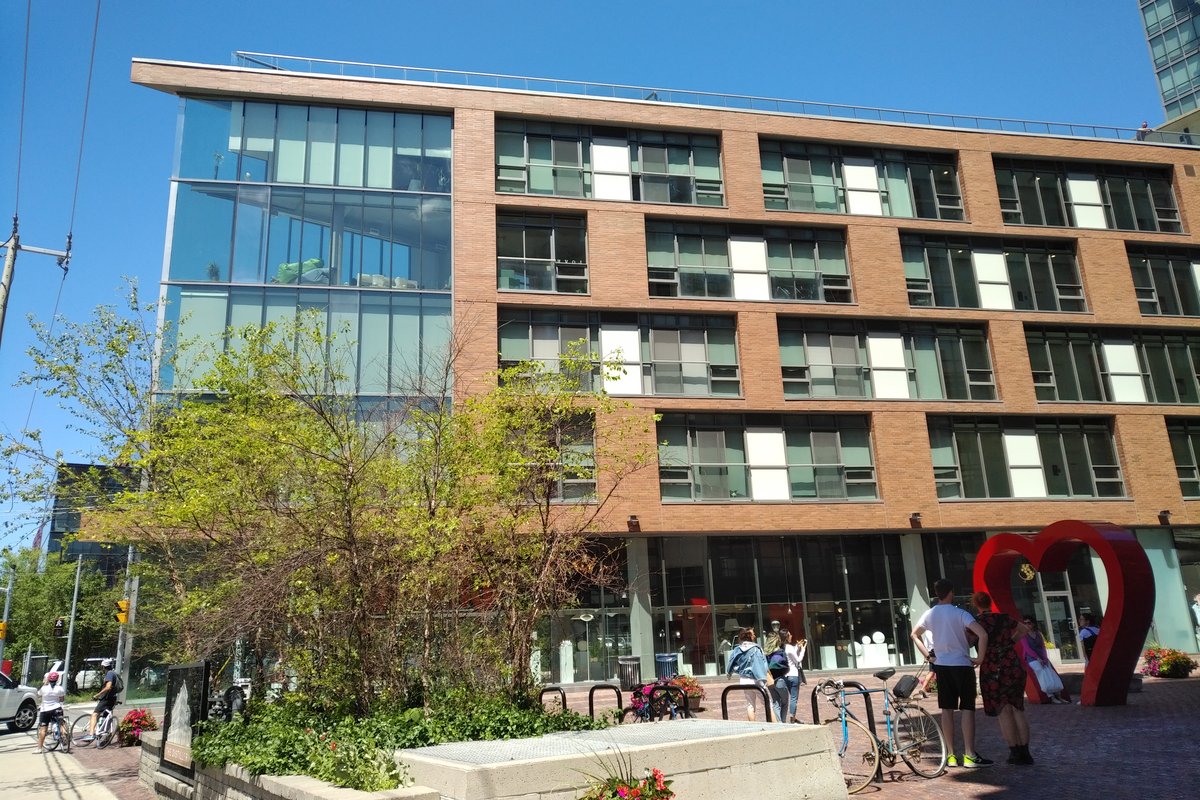 Brick warehouses and modern condos in Toronto's Distillery District, served by Mold Busters' GTA inspectors