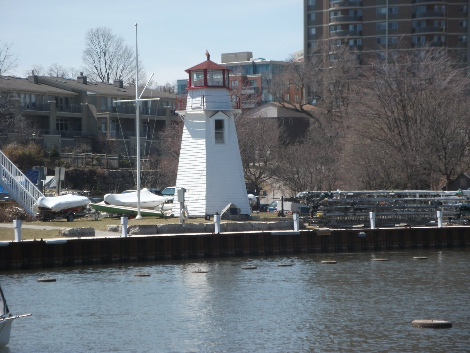 Oakville Harbour lighthouse at the mouth of Sixteen Mile Creek, in Mold Busters' Oakville service area